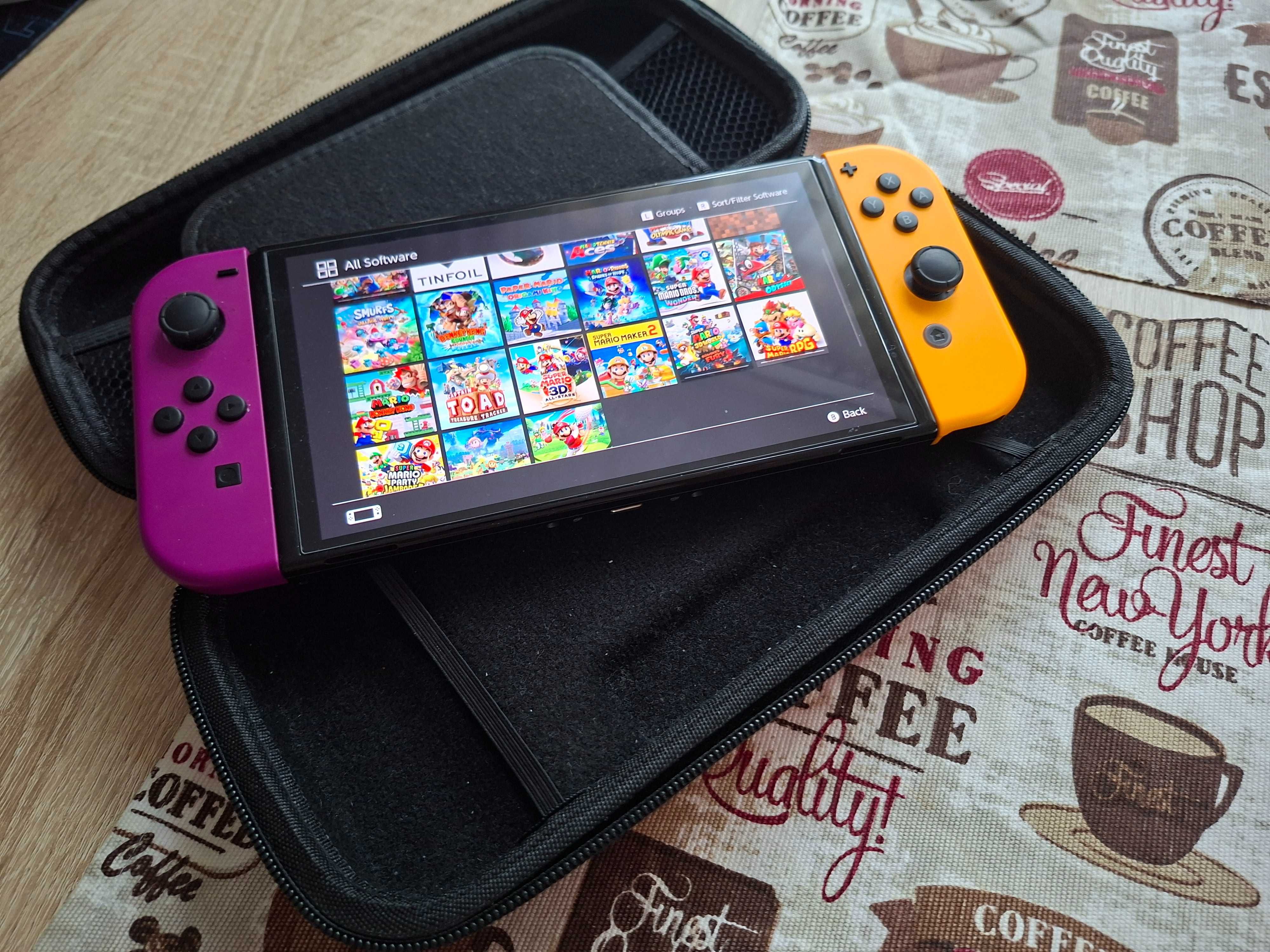 Nintendo switch oled wypasisona z mnistwem gier zamienię