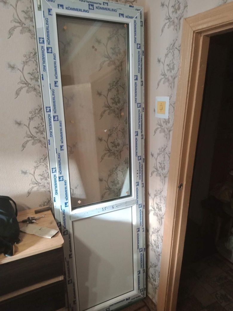 Двері на балкон пластикові