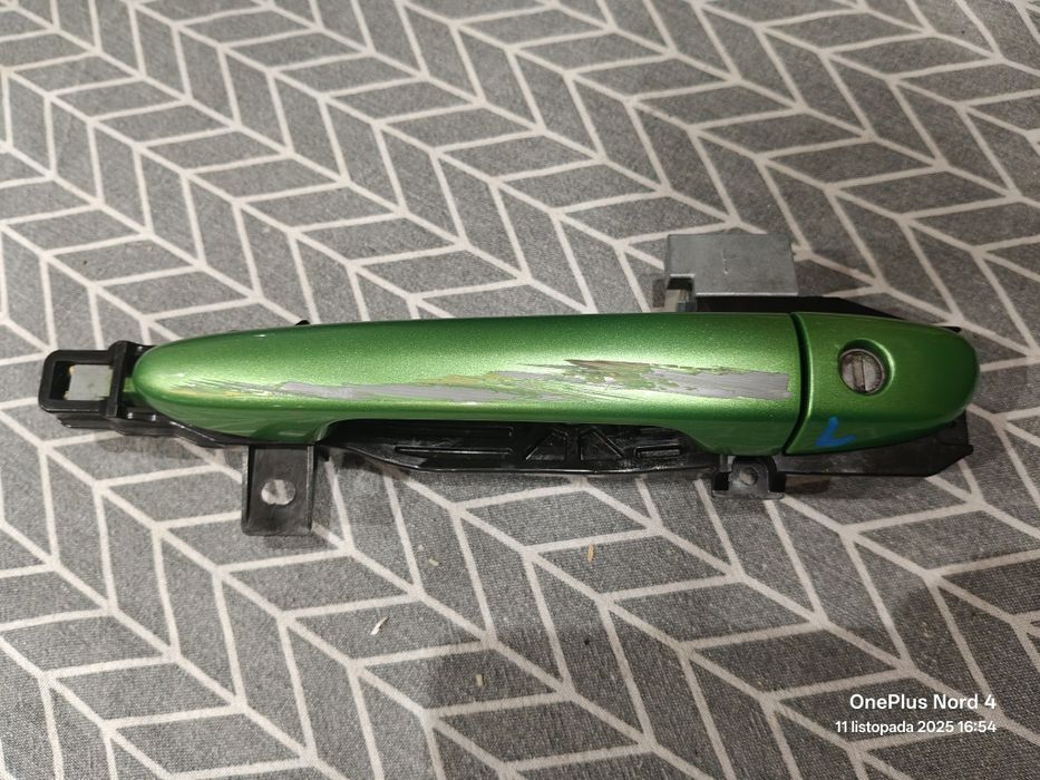 Klamka lewa przód przednia zielona Mazda 2 DE 07-10