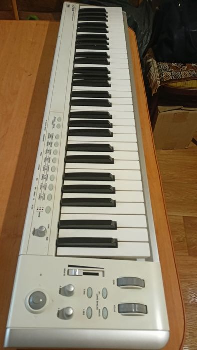 Korg k61p міді клавіатура
