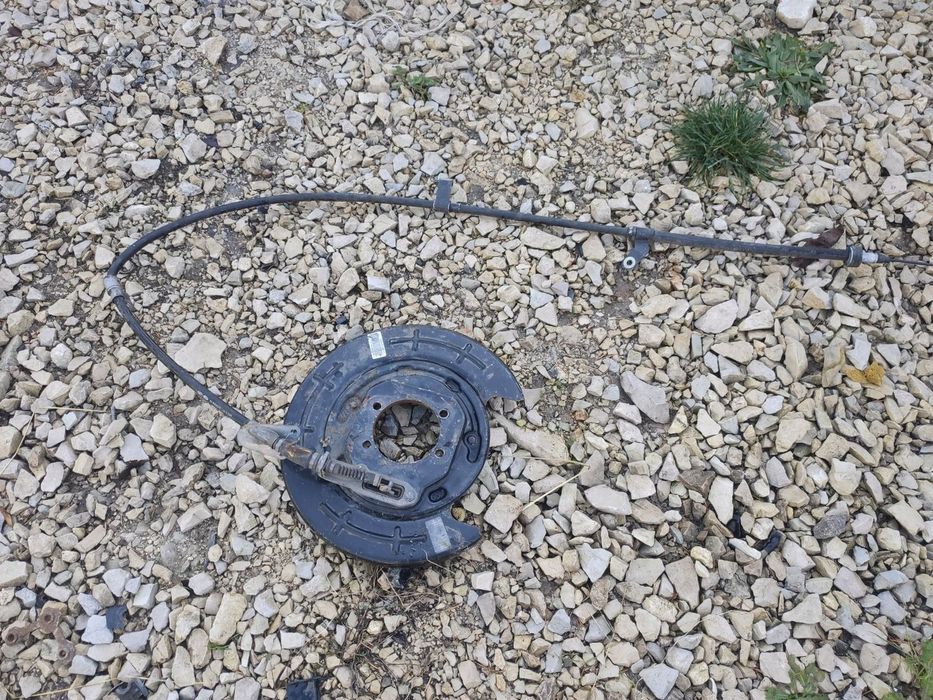 TARCZA KOTWICZNA LEWY TYŁ LINKA RĘCZNEGO KIA SORENTO III 3 2WD