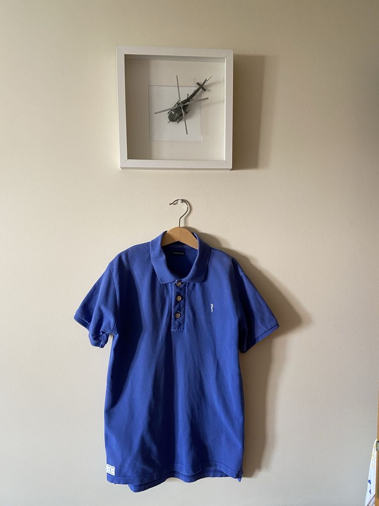 Polo azul lanidor menino.