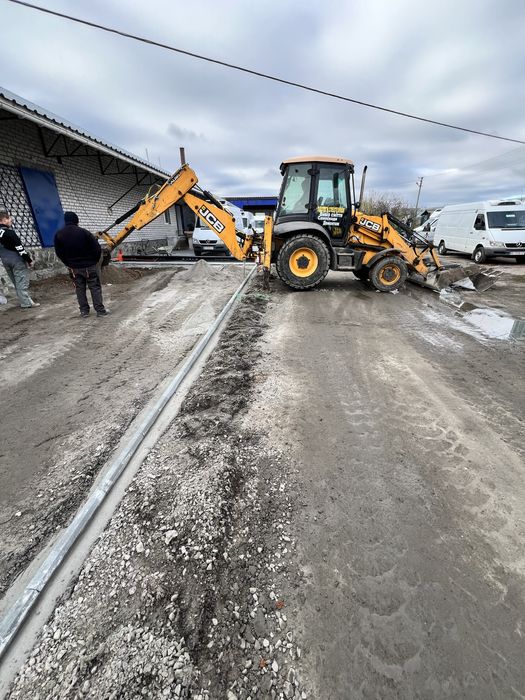 Послуги екскаватора,послуги спецтехніки,послуги самоскидів