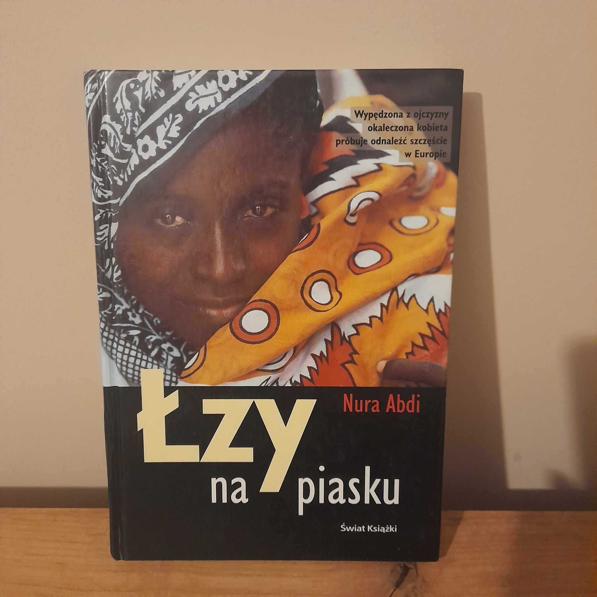 Łzy na piasku - Nura Abdi