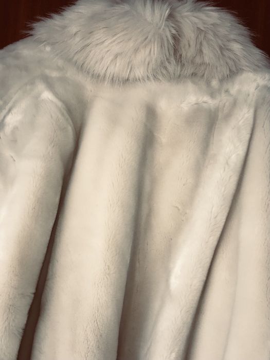 Elegante Capa branca, Nova