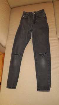 Spodnie jeans dziewczęce czarne z dziurami firmy Pull&Bear rozmiar 32