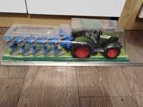Traktor z pługiem