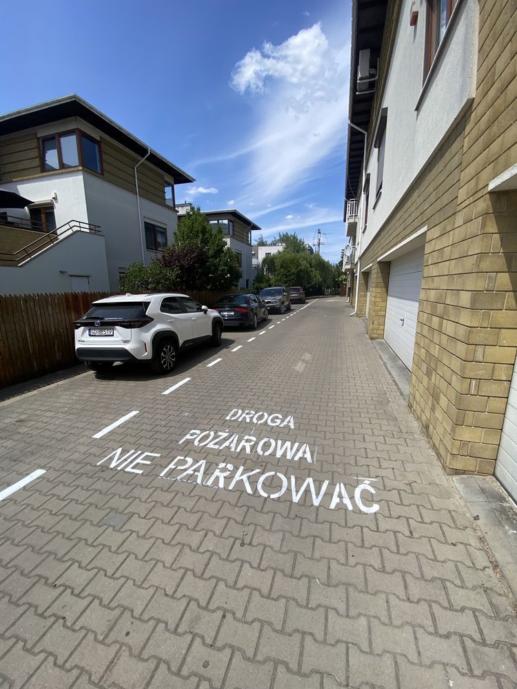 Oznakowanie poziome znaki drogowe malowanie pasów parkingów