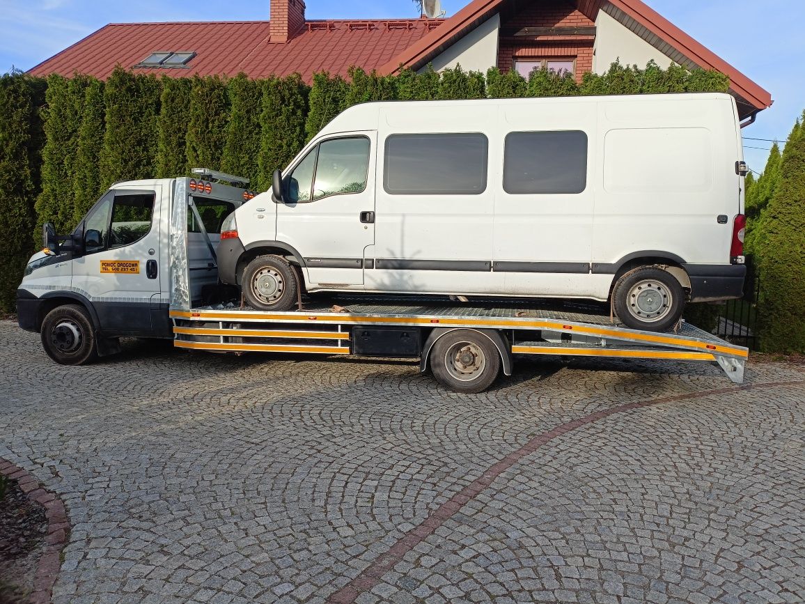 Usługi transportowe lawetą Transport maszyn transport bus PomocDrogowa