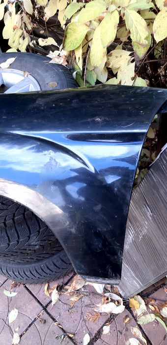 Крило ліве Forester 2004-2008