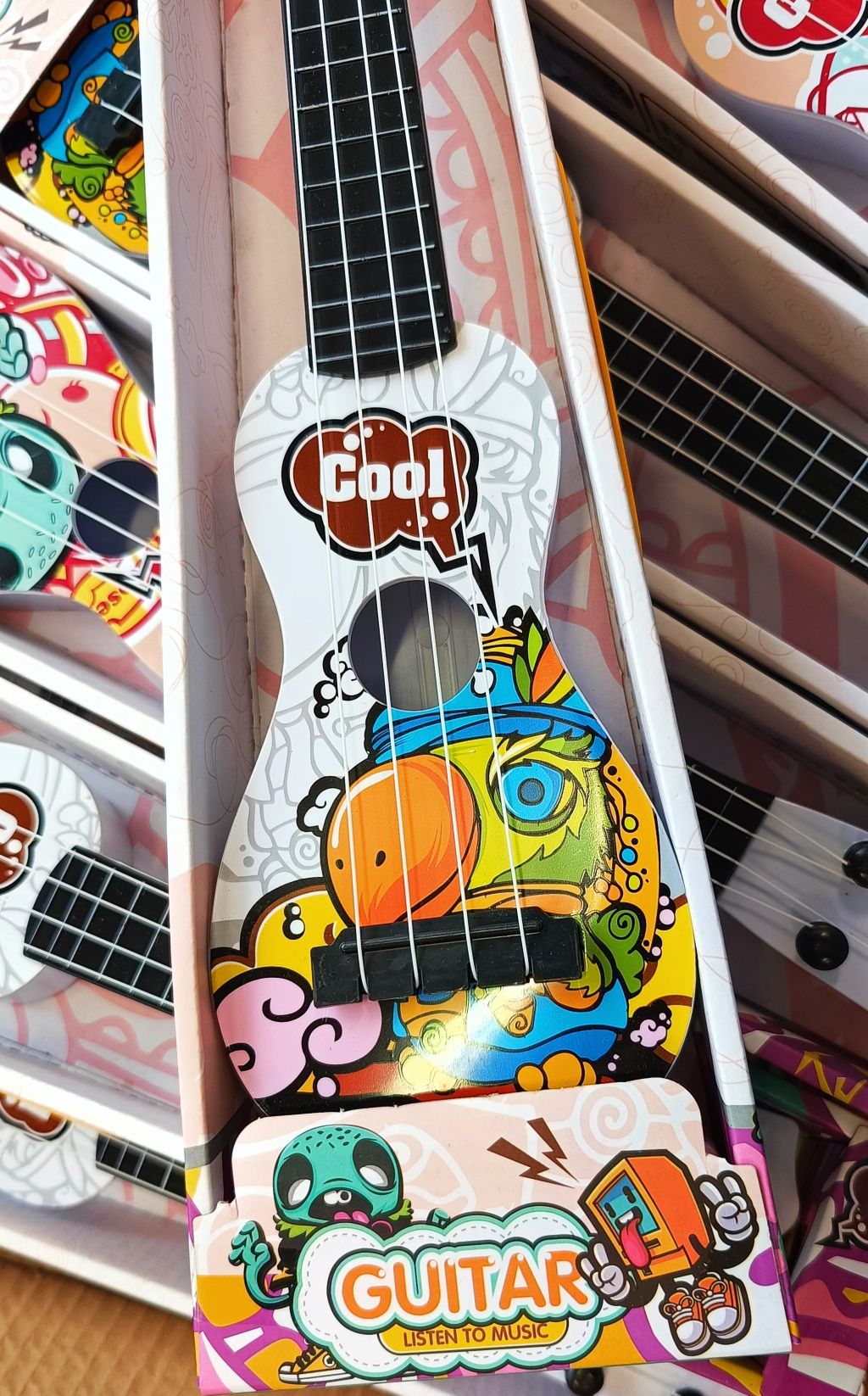 Extra gitarka ukulele kolorowa papuga