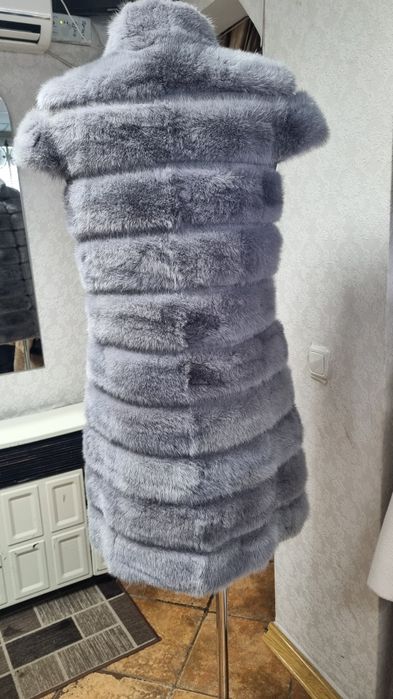 Норкрвая голубая жилетка