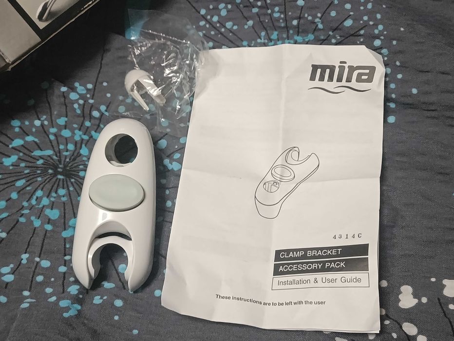 Uchwyt zaciskowy Mira Logic do słuchawki prysznicowej biały w pudełku