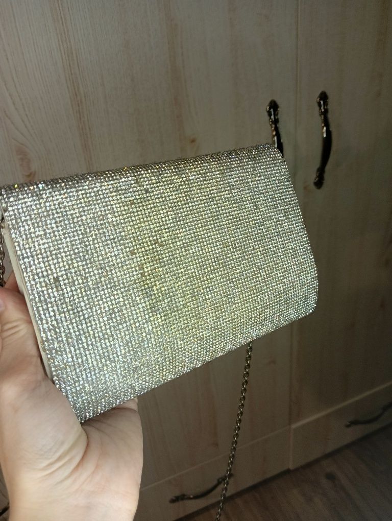 Клатч блискучий.