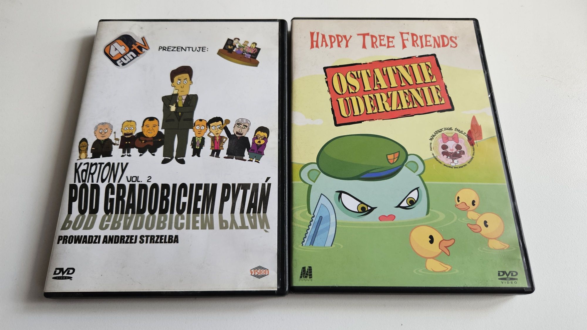 Filmy DVD - Kartony: Pod Gradobiciem Pytań + Happy Tree Friends