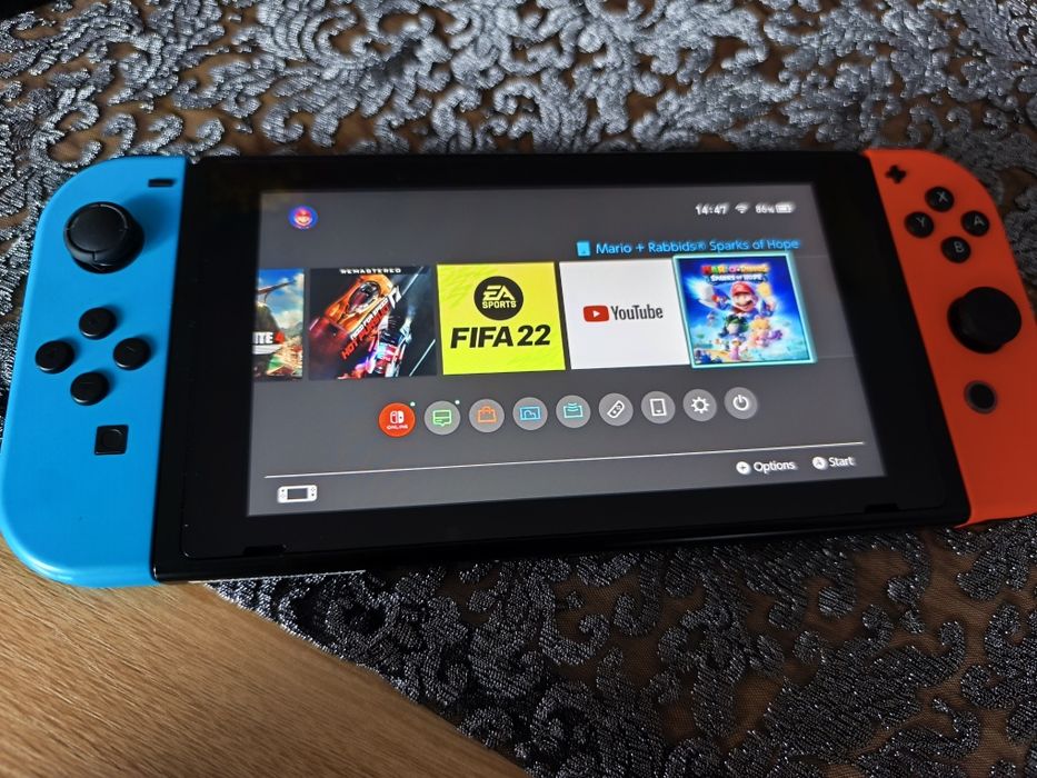 Nintendo switch V2 jak nowe karta 256gb z grami warto