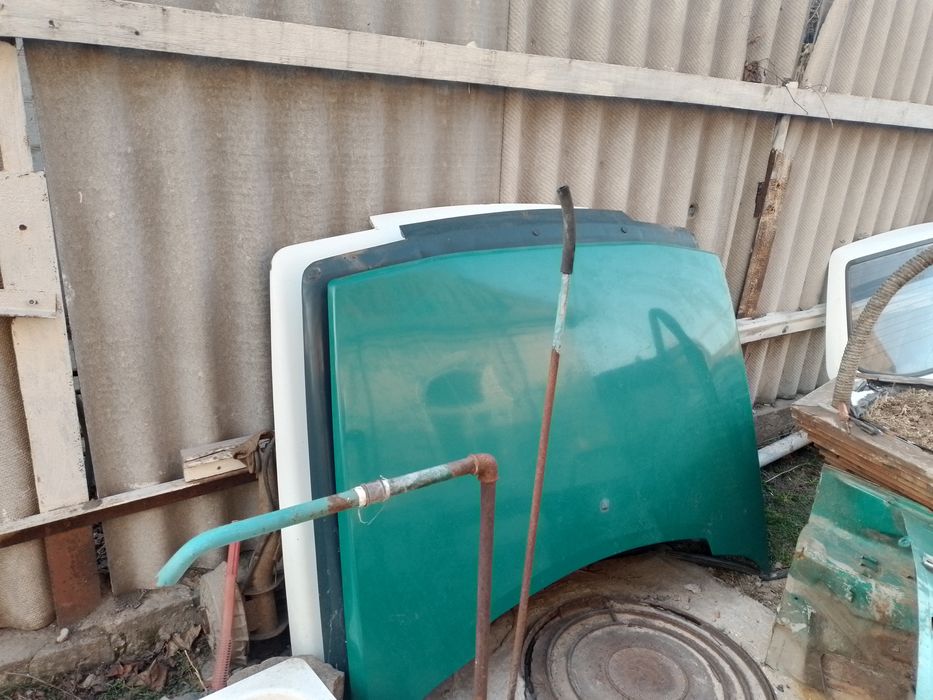 Капот двери Славута  Запчасти.