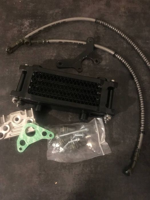 Комплект масляного радиатора — Новый