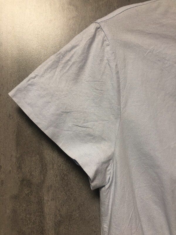 Zara - błękitna asymetryczna bluzka z krótkim rękawem roz M