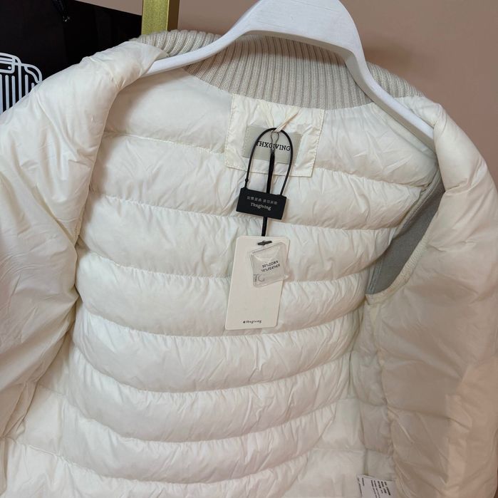 Пуховик женский с вязанными рукавами /жіночий пуховик чорний білий