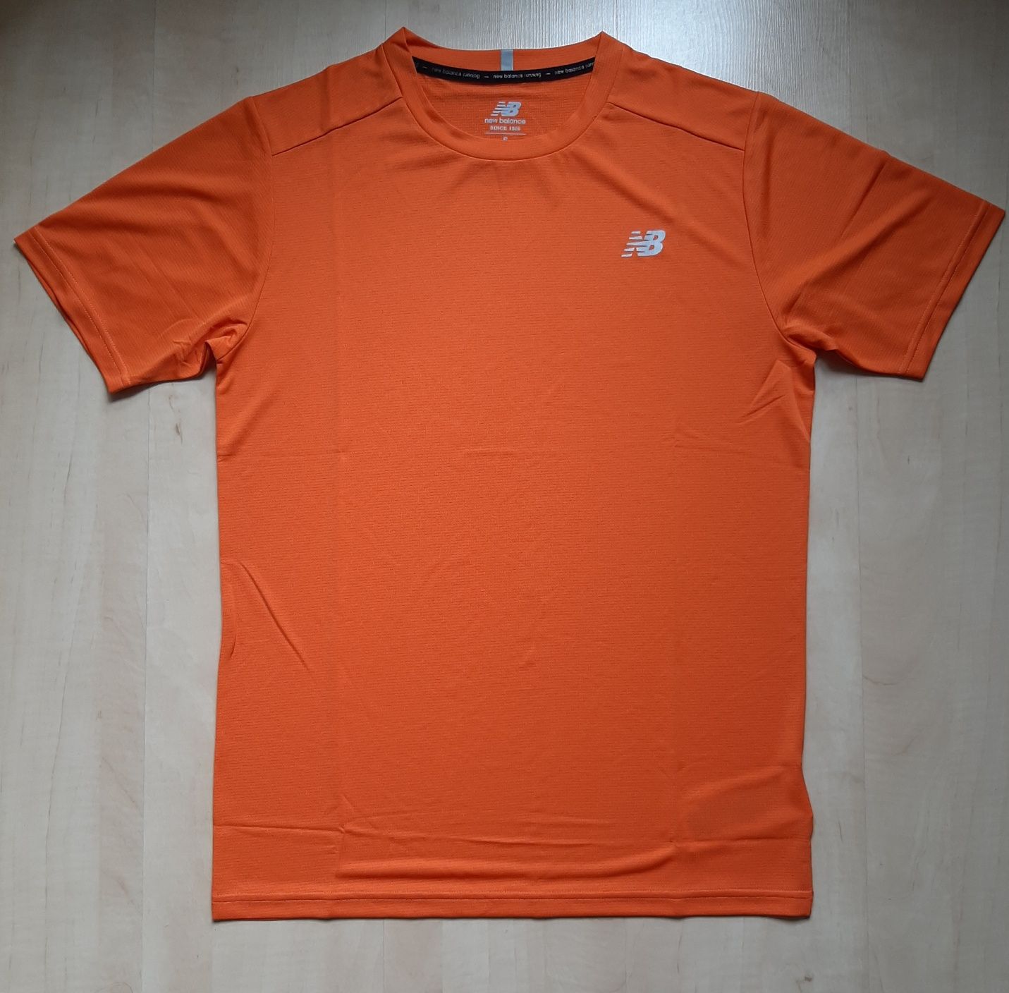 Pomarańczowa, szybkoschnąca koszulka NEW BALANCE, roz. S