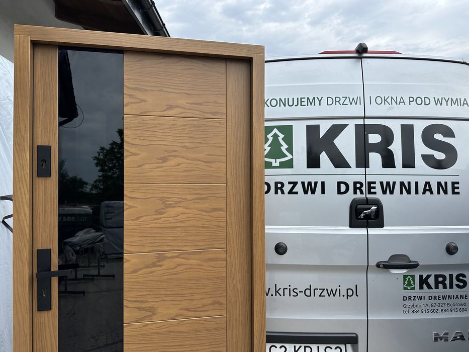 Drzwi zewnetrzne drewniane Montaż Cała Polska dębowe czarna szyba