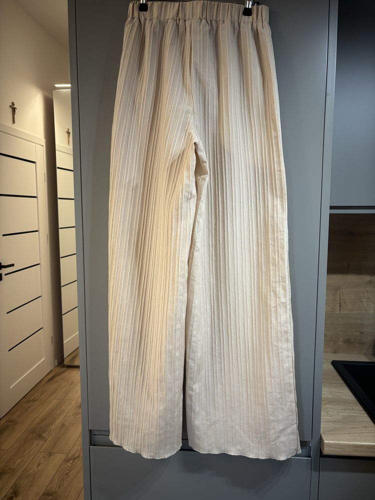 Szerokie zwiewne spodnie na lato wide leg tall roz S/