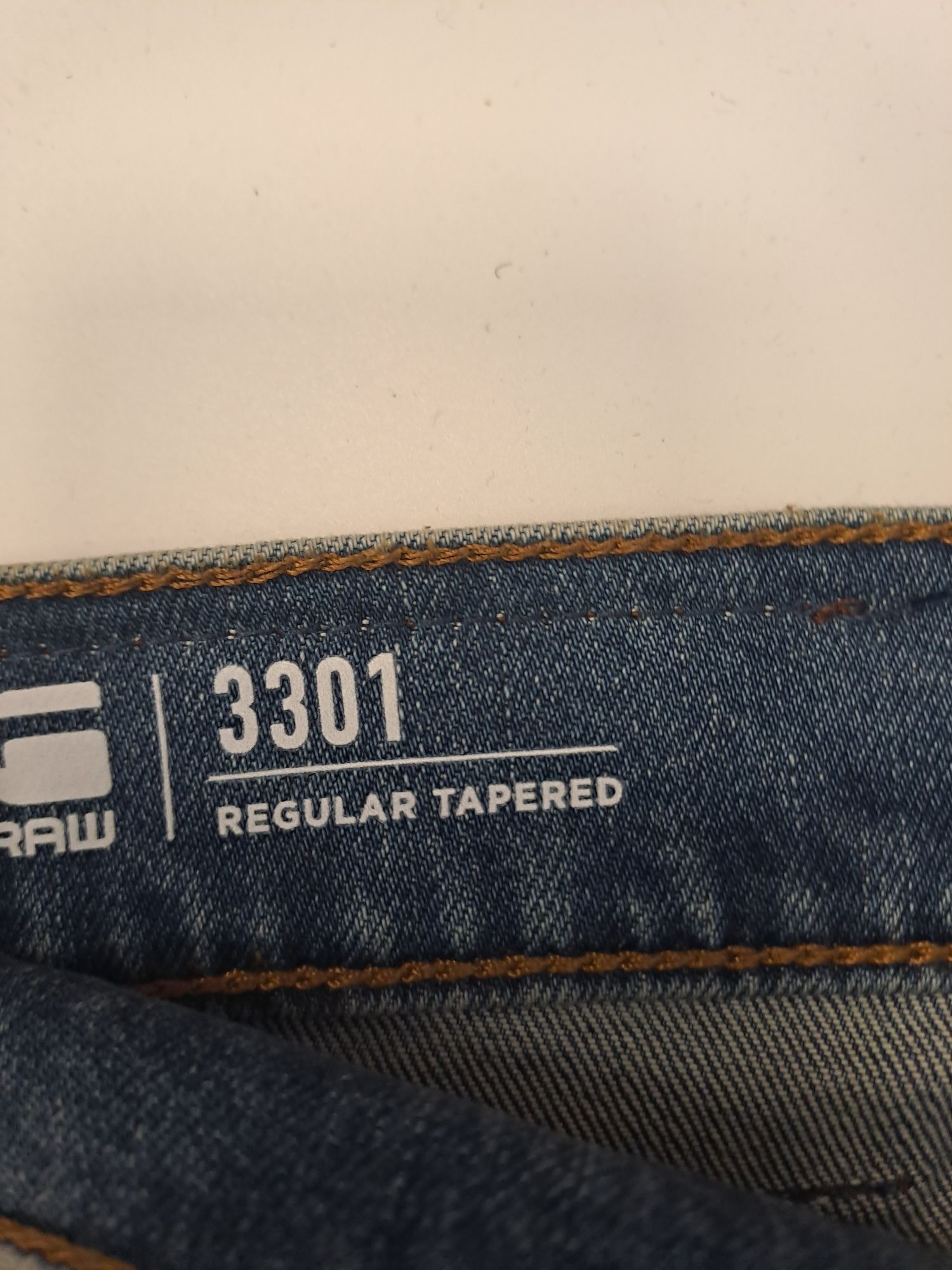 Nowe z metką jeansy G-STAR RAW 3301 uszkodzone