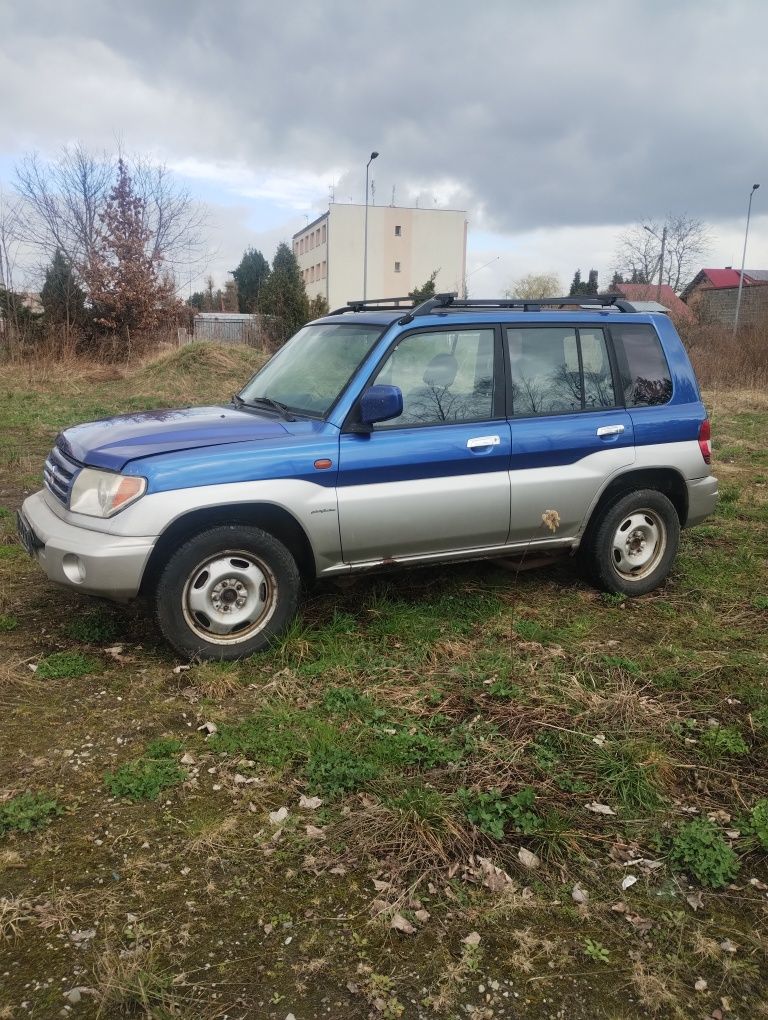 przedni błotnik lewy pajero pinin drzwi przednie tylne prawe lewe