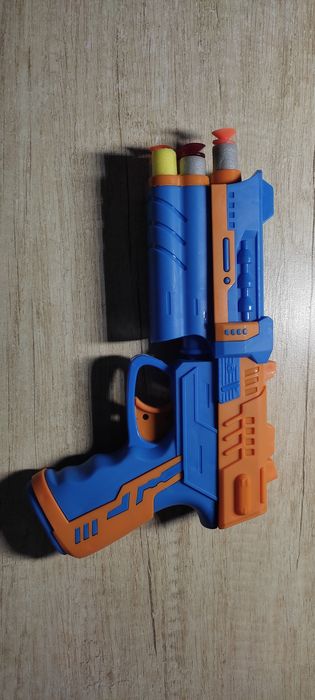 Игрушка пистолет