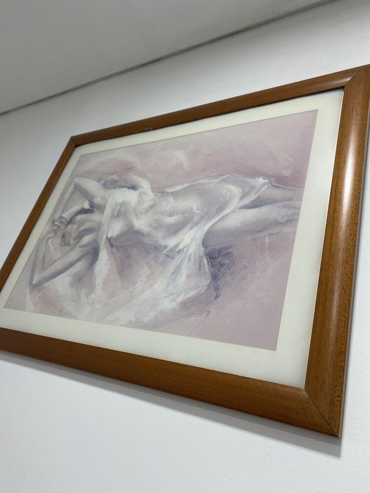 Quadro em muldura de madeira