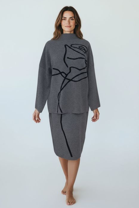 Жіночий трикотажний костюм.