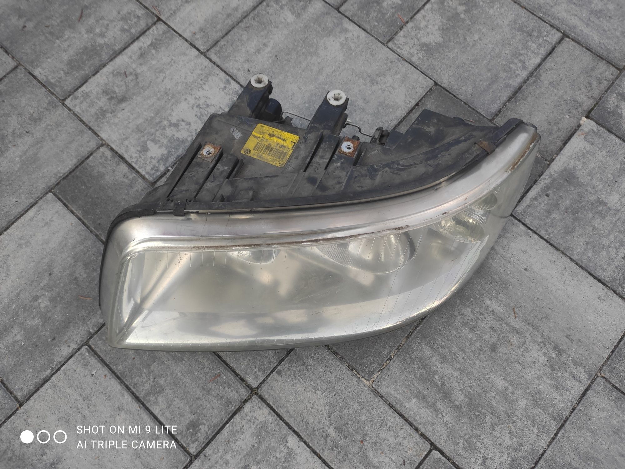 Lampa reflektor przedni przód Volkswagen Transporter T5 Oryginał Europ