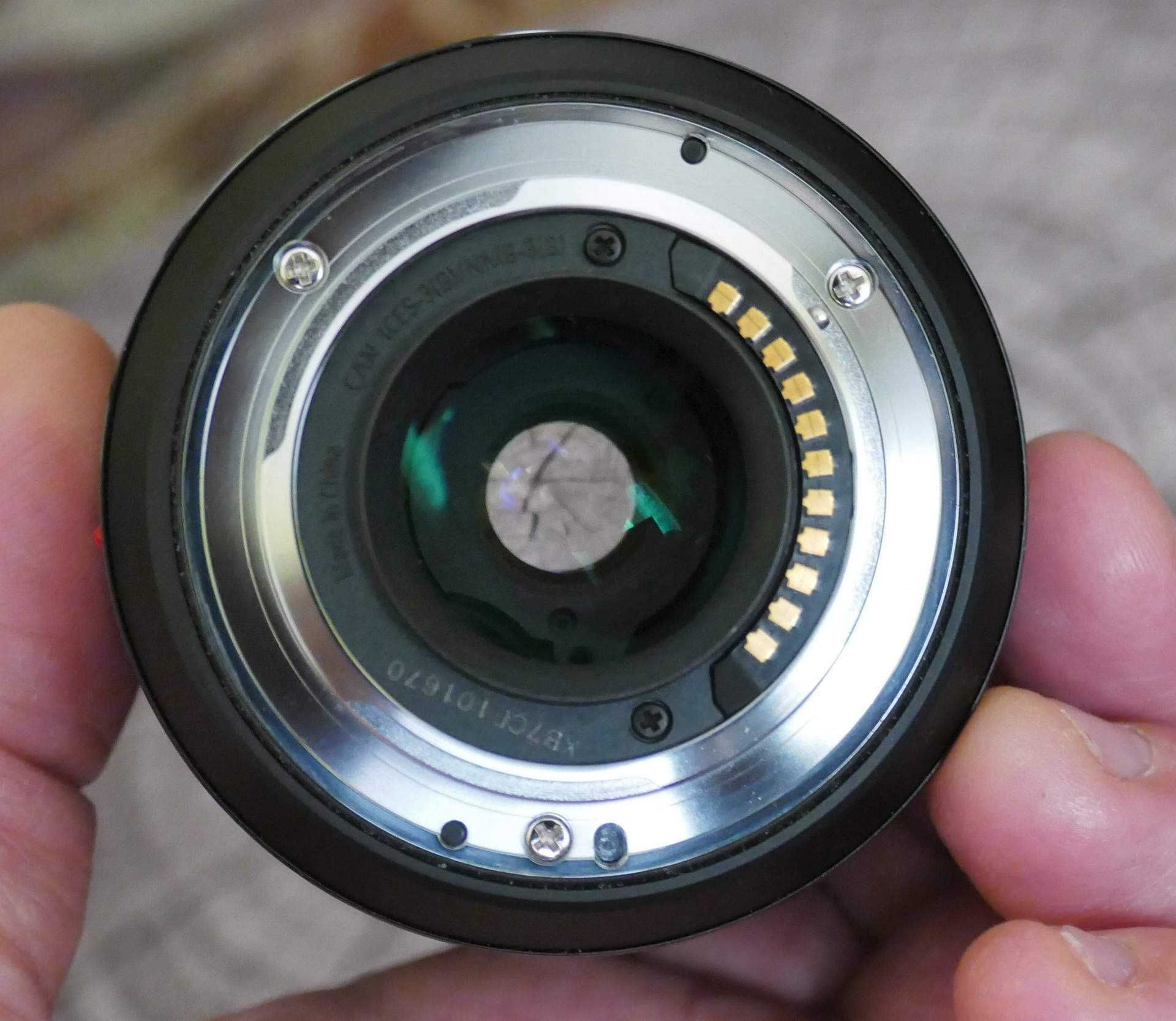 PANASONIC LUMIX DMC-GH3 z obiektywem oraz oryginalnym gripem