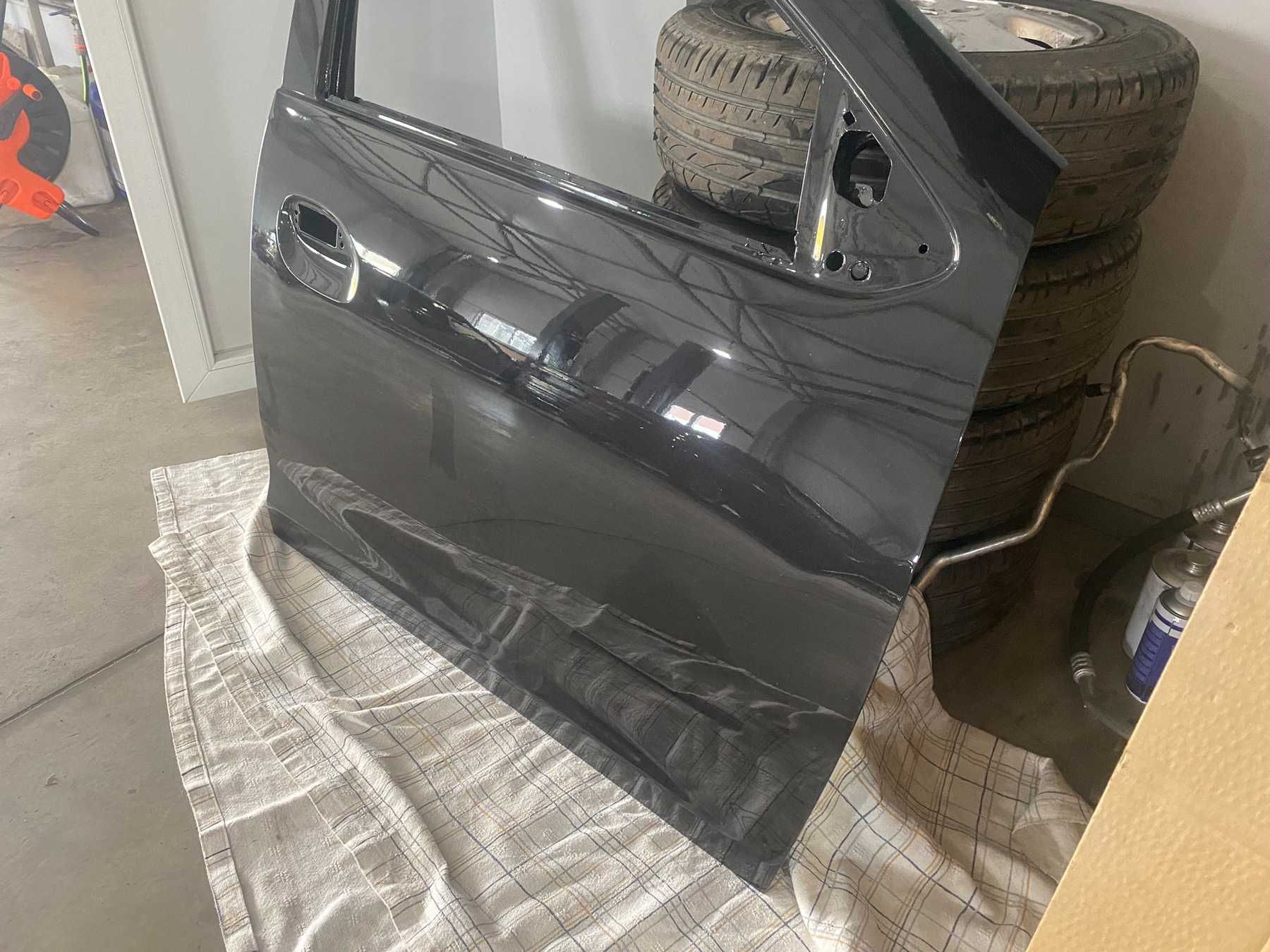 Дверка передня права Renault Duster NV676