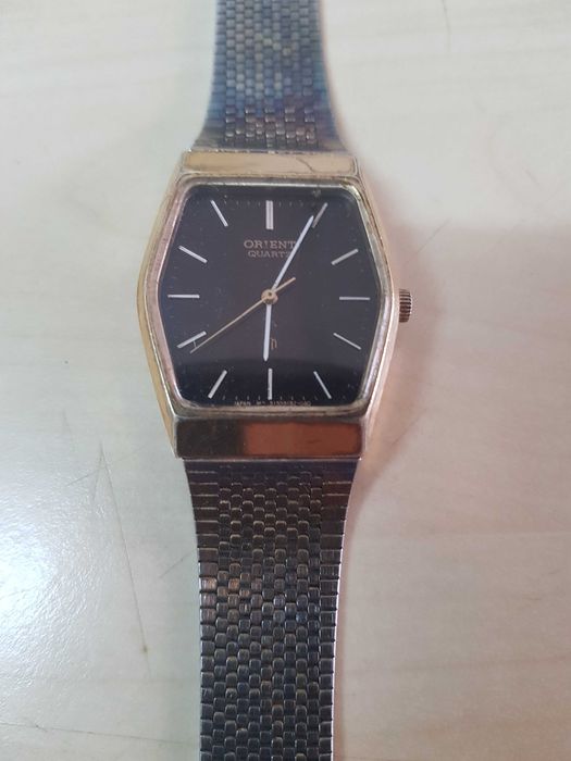 Zegarek nareczny ORIENT Quartz GP sprawny kolor zloty i czarny
