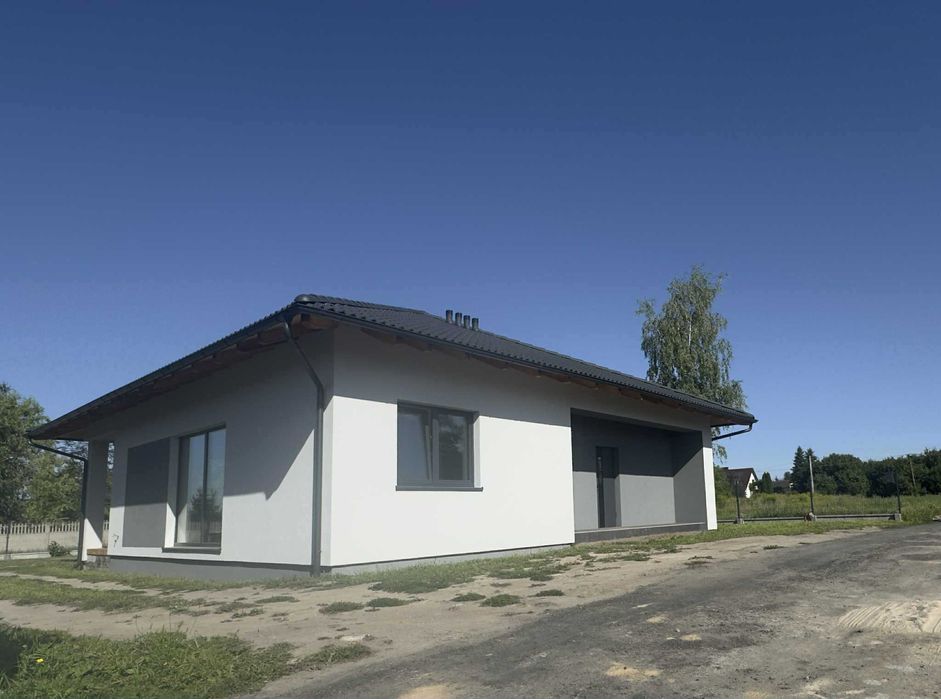 Nowy Dom w stanie deweloperskim z pompą ciepła.