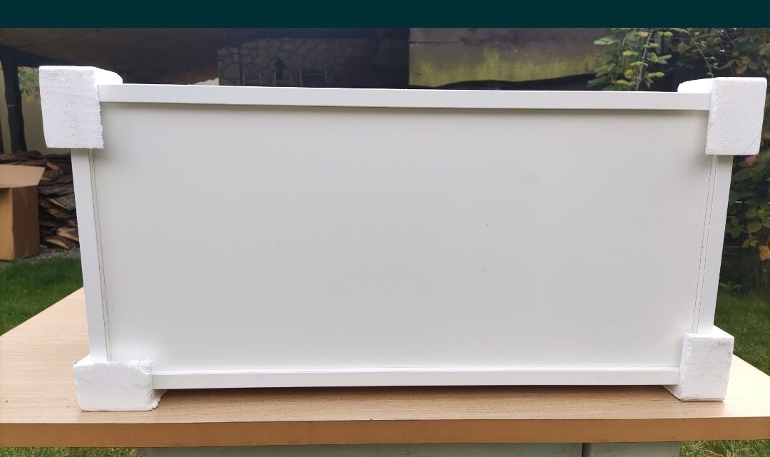 Biała niska komoda szafka dwie szuflady