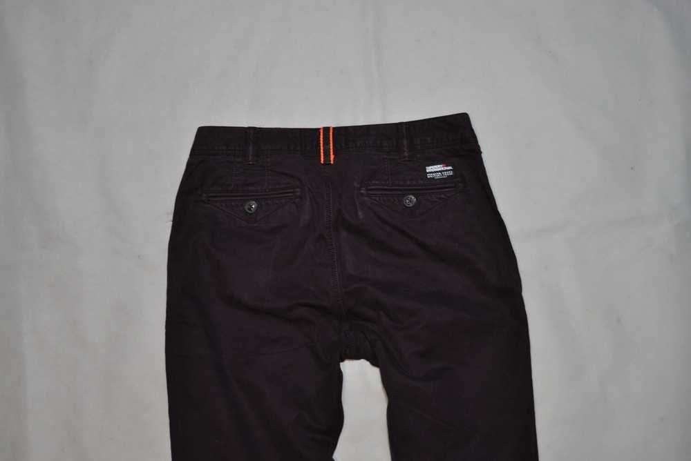 SUPERDRY MILITARY S 82cm 30/30 męskie spodnie jeansowe slim fit s7v