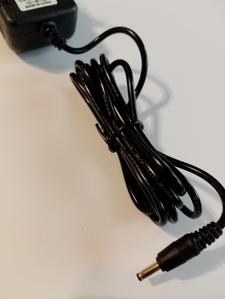 Zasilacz AC/DC ADAPTER YHSW-090100V 9V 1A plus ładowarka do szczoteczk