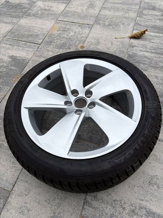 Felgi 5x100 z oponami zimowymi Fulda