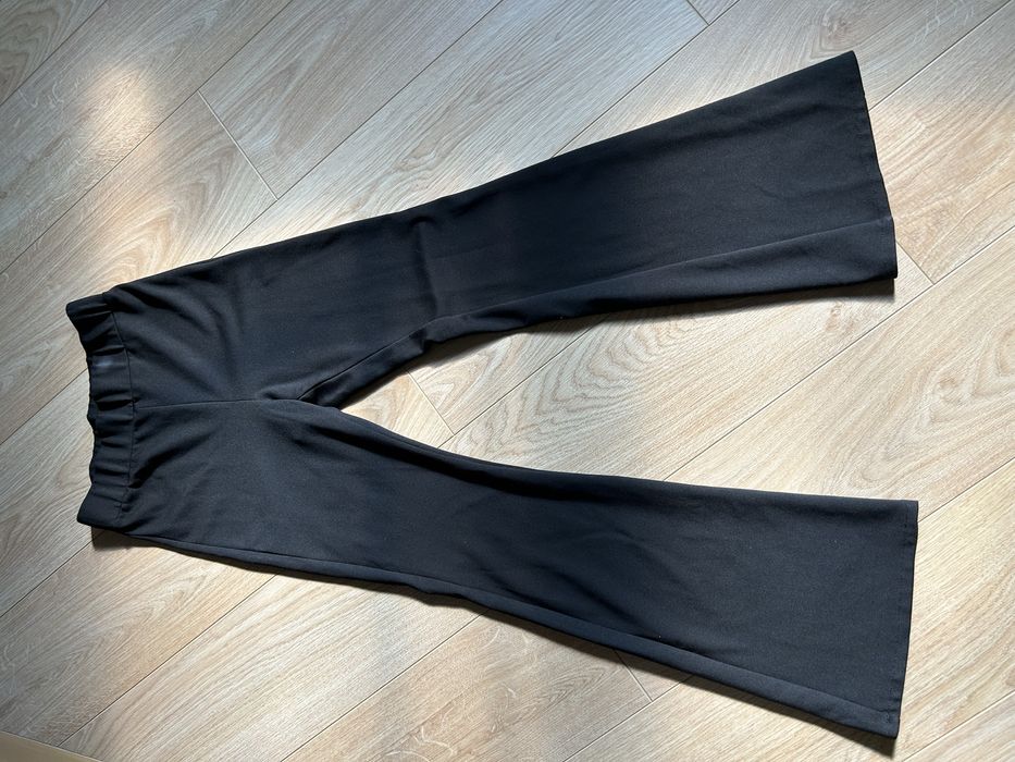 Штани ( легінси) чорні ширші знизу