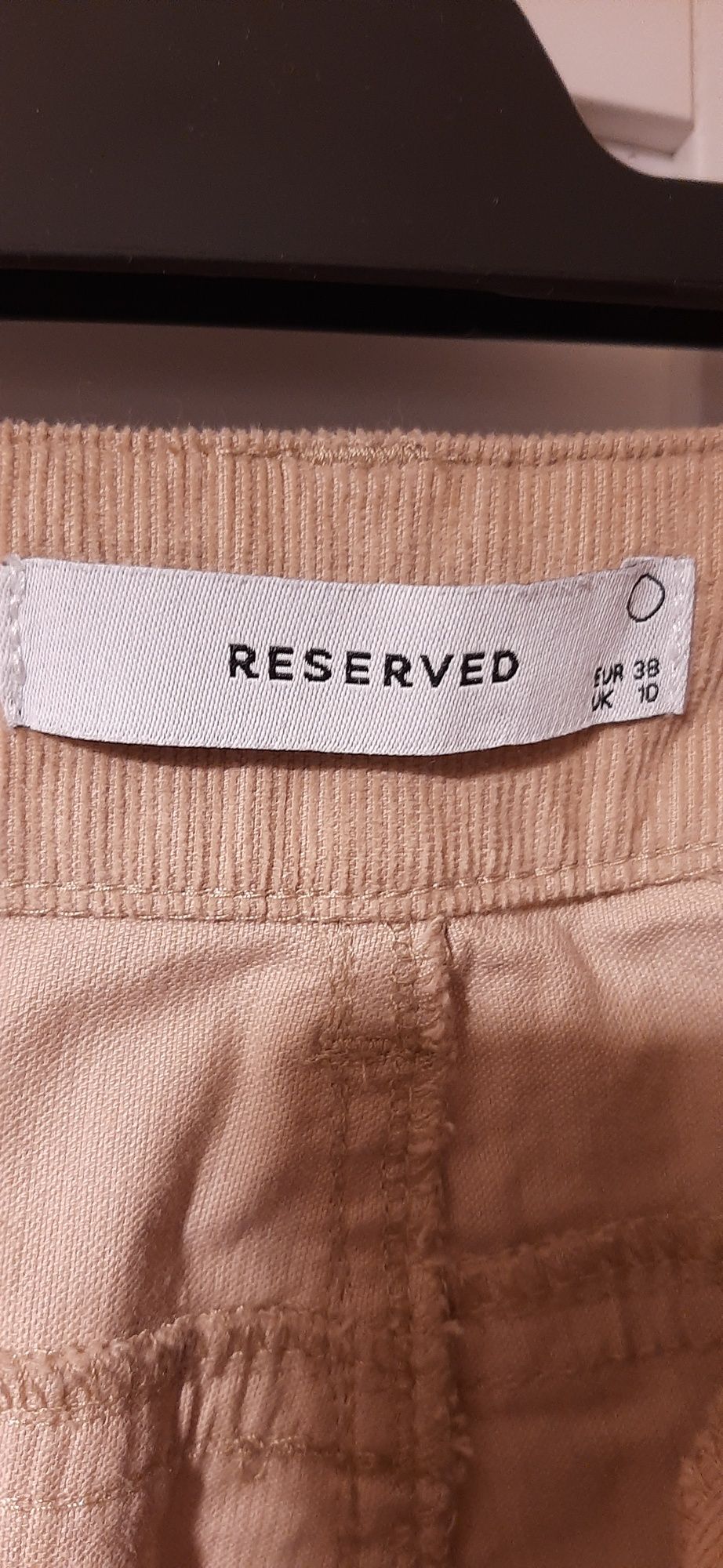Spodnie sztruksowe rozszerzane damskie jasnobrązowe 38 Reserved