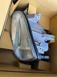 Farol Renault Clio