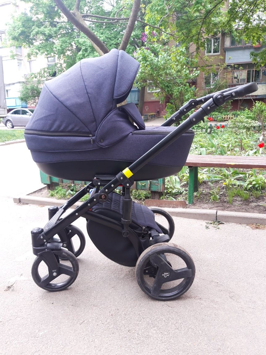 Продам каляску 2 в 1 Baby Pram bellini тёмно синего цвета(джинс)