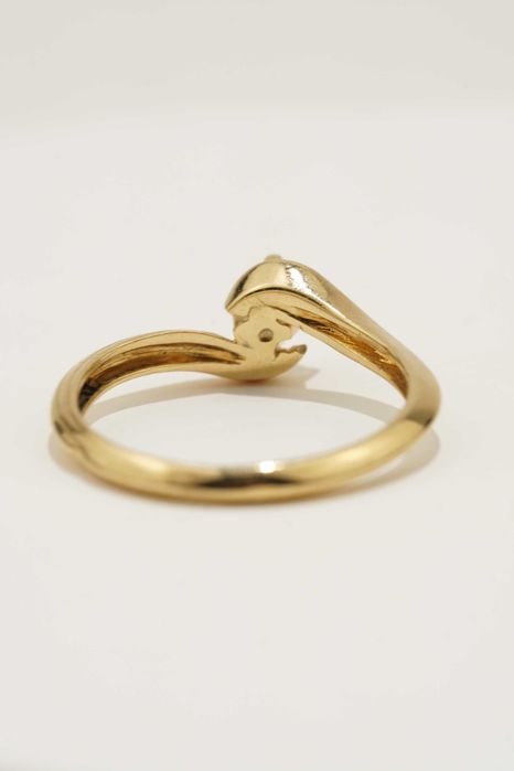 Złoty pierścionek z brylantem 0.23 ct