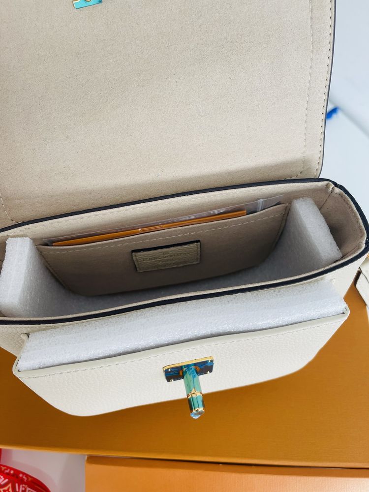 Сумка Louis Vuitton Lockme tender pochette metis