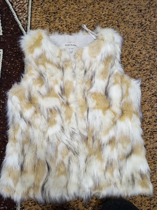 Желетка із хутра жіноча