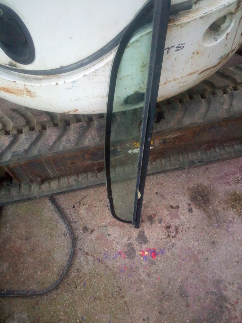 Bobcat 425g vidros e porta de cabine