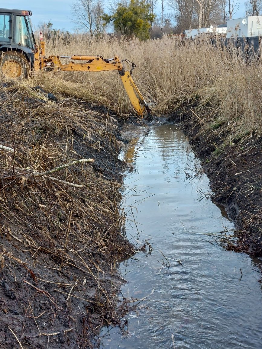 Usługi koparko ładowarką,  układanie kostki brukowej . Prace